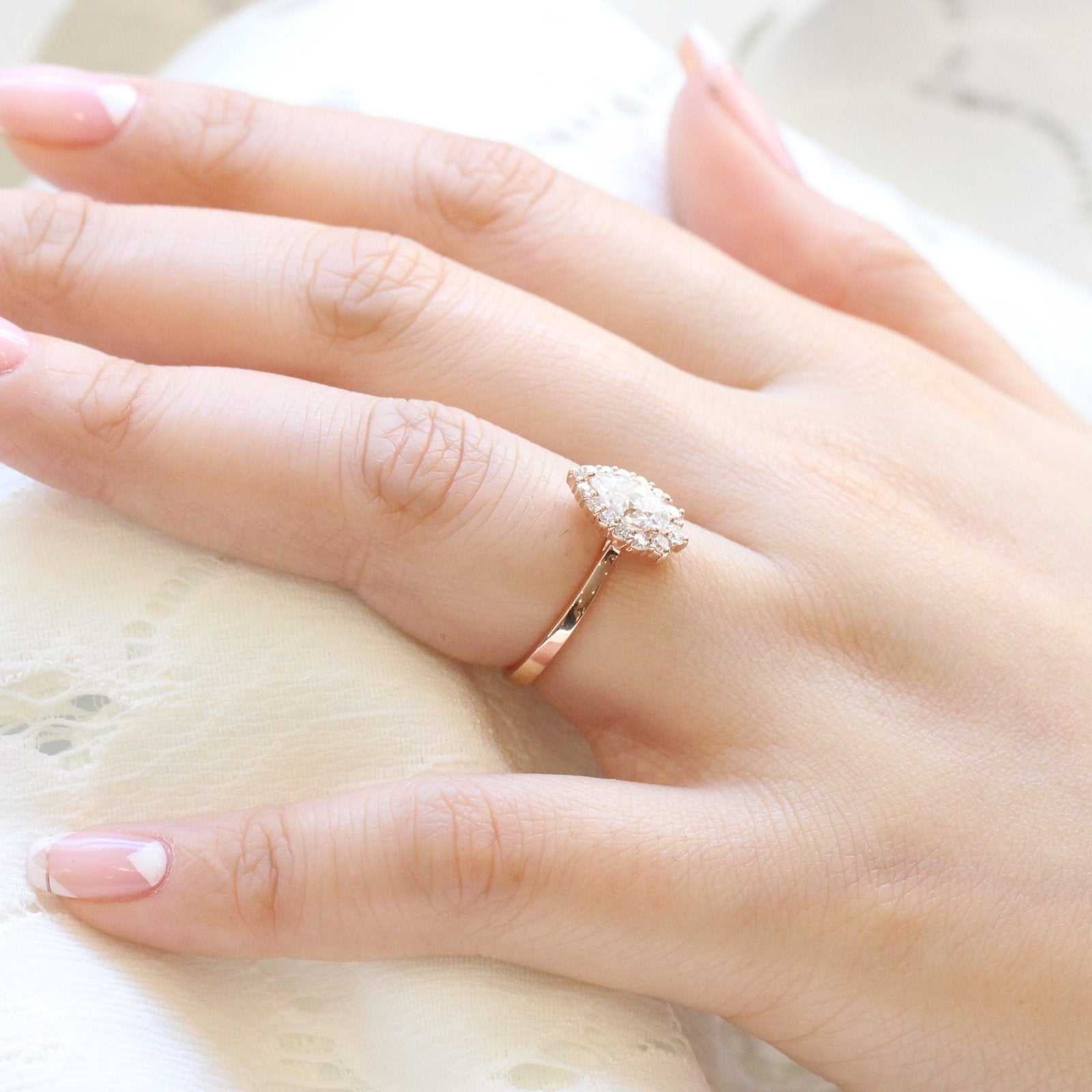 1.0CT Pear Cut Halo Style Moissanite Engagement Ring