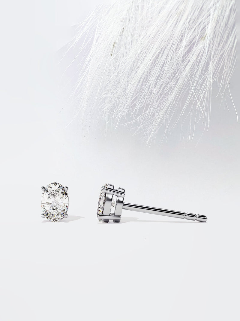 Oval Cut Moissanite Stud Diamond Earrings in Yellow Gold