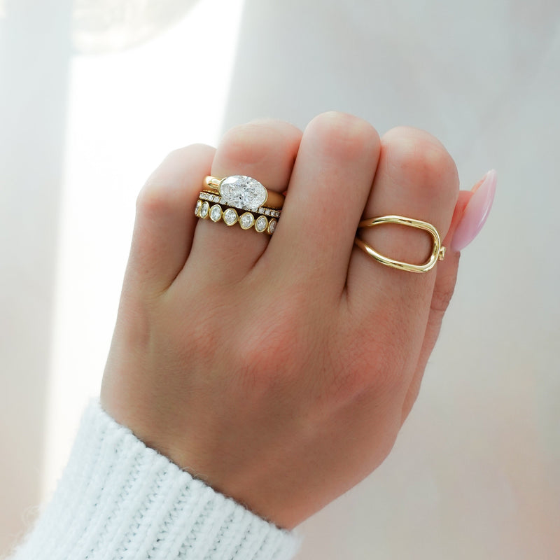 Bold Minimalism: 4mm East-West Oval Half Bezel Ring