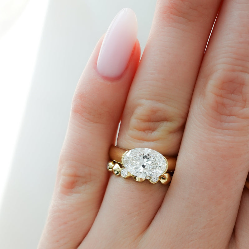 Bold Minimalism: 4mm East-West Oval Half Bezel Ring