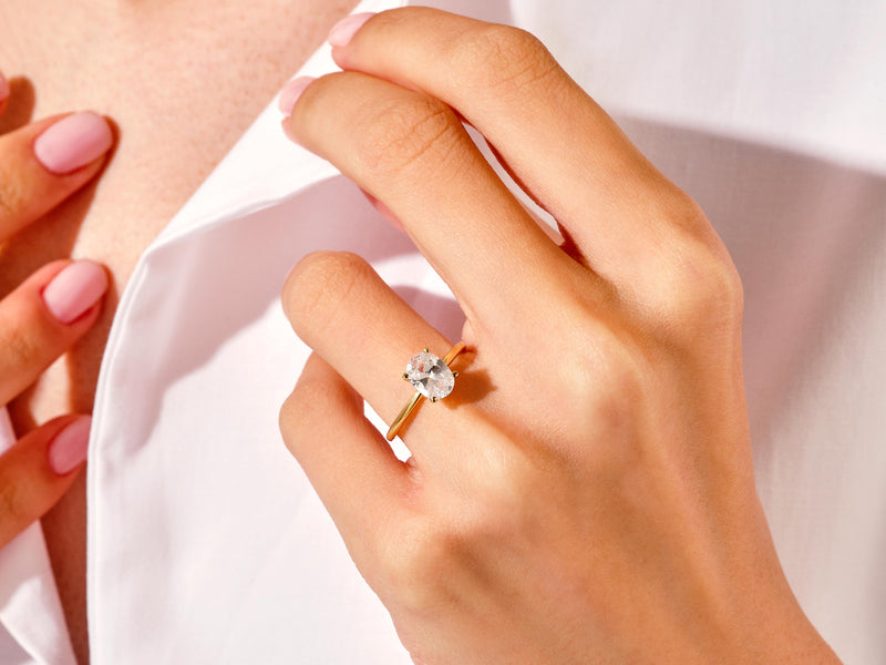 4-Prong Solitaire Oval Cut Moissanite Engagement Ring (1.50 CT)