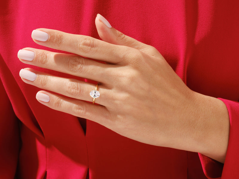 4-Prong Solitaire Oval Cut Moissanite Engagement Ring (1.50 CT)