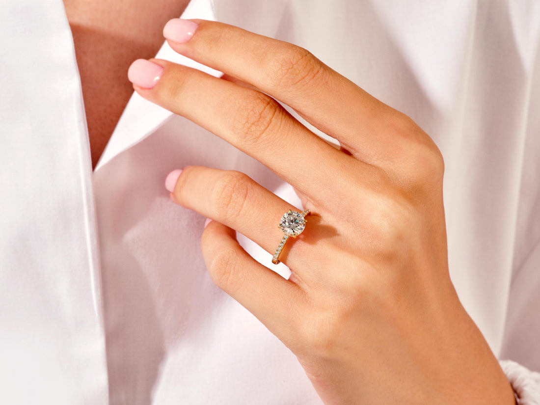 Cathedral Round Cut Moissanite Engagement Ring with Pave Set Side Stones (1.50 CT)