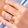 Cathedral Round Cut Moissanite Engagement Ring with Pave Set Side Stones (1.50 CT)