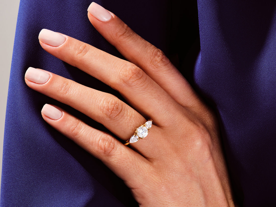 Three Stone Moissanite Engagement Ring with Pear Cut Accents (2.00 CT)