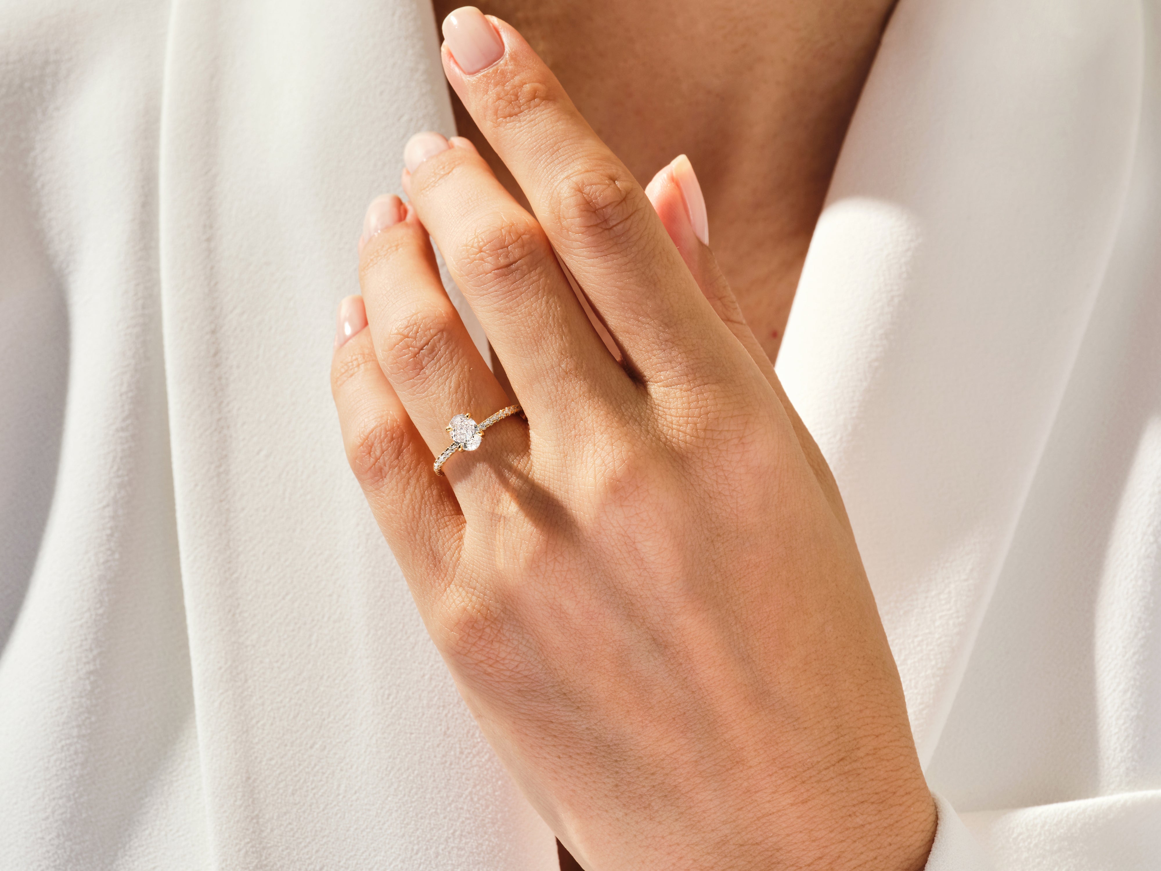 Hidden Halo Oval Moissanite Engagement Ring with Sidestones (1.00 CT)