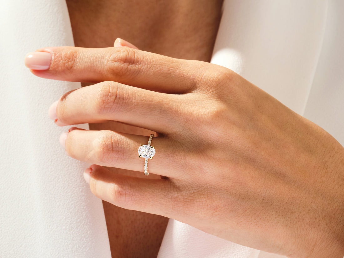 Hidden Halo Oval Moissanite Engagement Ring with Sidestones (1.50 CT)
