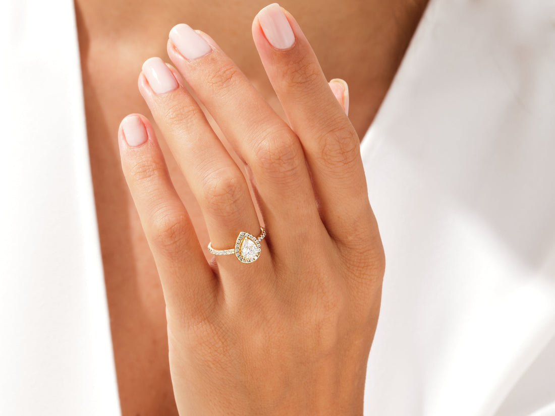 Pear Halo Moissanite Engagement Ring with Pave Set Side Stones (1.00 CT)