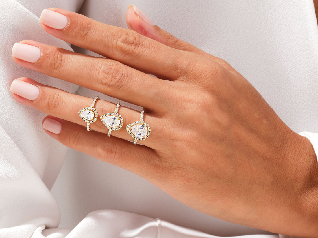 Pear Halo Moissanite Engagement Ring with Pave Set Side Stones (1.00 CT)