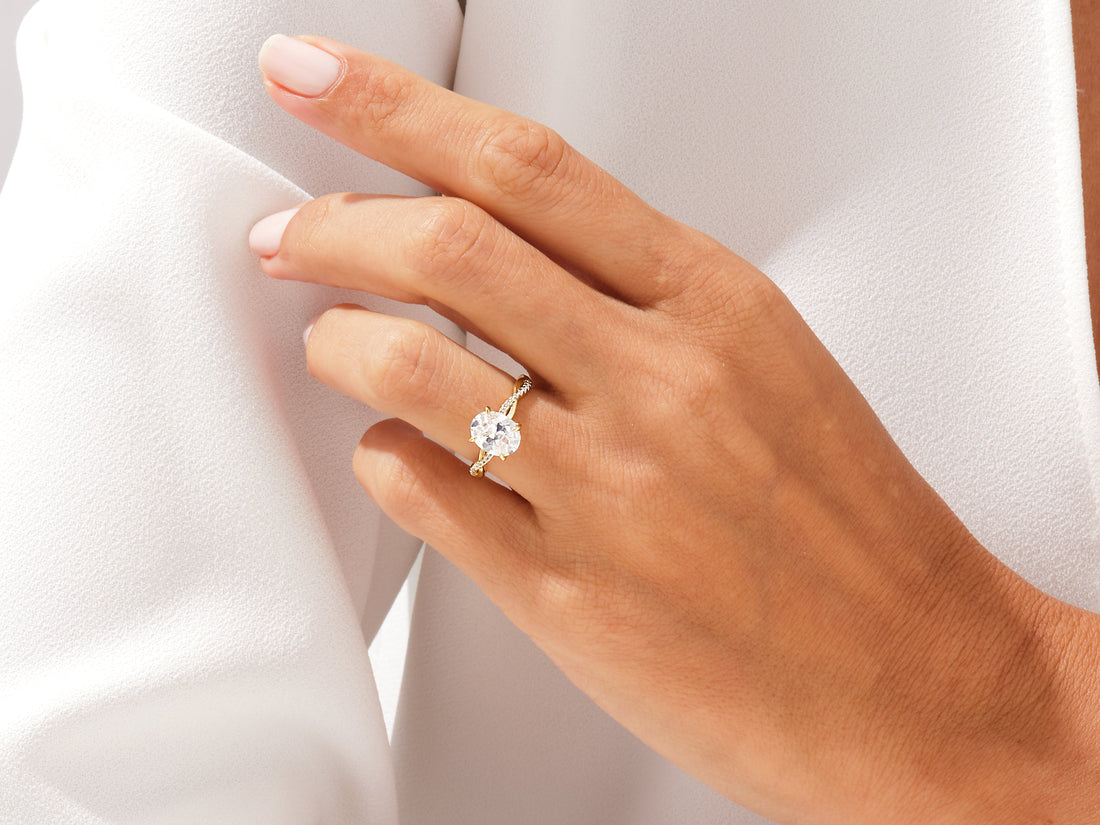 Oval Twisted Moissanite Engagement Ring with Pave Set Side Stones (2.00 CT)