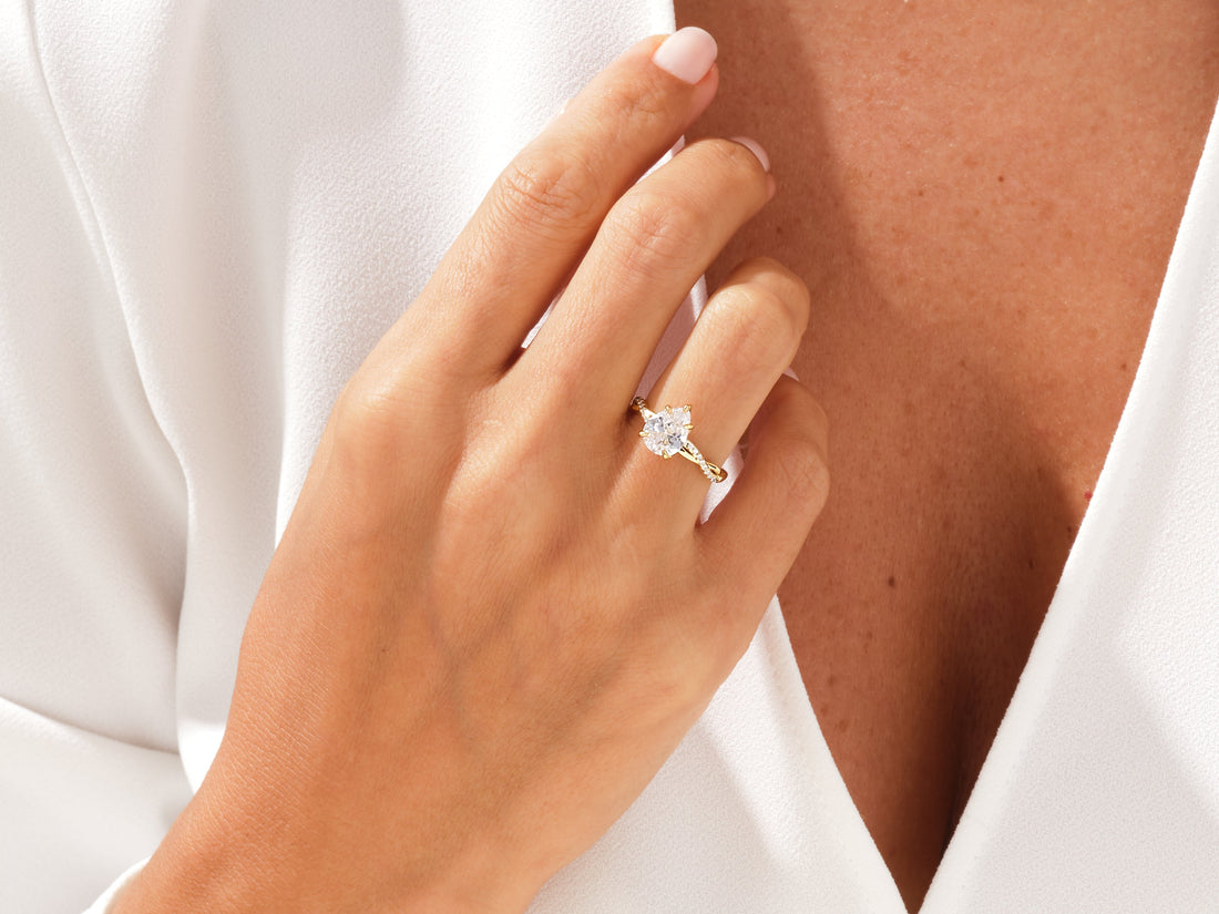 Pear Twisted Moissanite Engagement Ring with Pave Set Side Stones (2.00 CT)