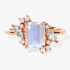 Emerald Cut Moonstone Engagement Ring with Marquise and Round Moissanite Sidestones