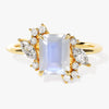 Emerald Cut Moonstone Engagement Ring with Marquise and Round Moissanite Sidestones