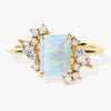 Emerald Cut Opal Engagement Ring with Marquise and Round Moissanite Sidestones