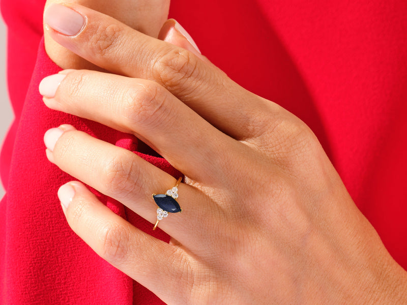 Marquise Blue Sandstone Engagement Ring with Moissanite Sidestones.