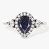 Pear Halo Blue Sandstone Engagement Ring with Moissanite Sidestones.