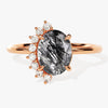 Oval Black Rutilated Quartz Engagement Ring with Round Moissanite Sidestones.