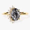 Oval Black Rutilated Quartz Engagement Ring with Round Moissanite Sidestones.