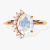 Oval Moonstone Engagement Ring with Round Moissanite Sidestones