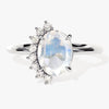 Oval Moonstone Engagement Ring with Round Moissanite Sidestones