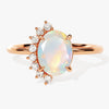 Oval Opal Engagement Ring with Round Moissanite Sidestones