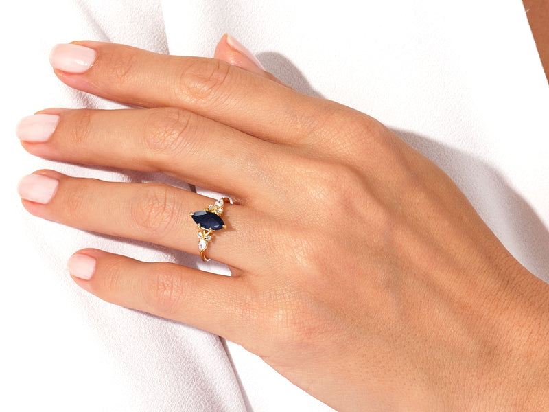 Marquise Blue Sandstone Engagement Ring with Moissanite Cluster.