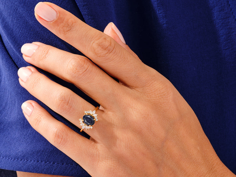 Oval Blue Sandstone Engagement Ring with Moissanite Cluster.