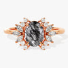 Oval Black Rutilated Quartz Engagement Ring with Moissanite Cluster.