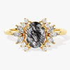 Oval Black Rutilated Quartz Engagement Ring with Moissanite Cluster.