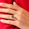 Oval Halo Blue Sandstone Engagement Ring with Moissanite Sidestones.
