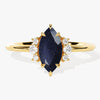 Marquise Blue Sandstone Engagement Ring with Round Moissanite Sidestones.