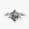 Long Hexagon Black Rutilated Quartz Engagement Ring with Baguette Moissanite Sidestones.