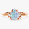 Pear Opal Engagement Ring with Round Moissanite Sidestones