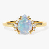 Pear Opal Engagement Ring with Round Moissanite Sidestones