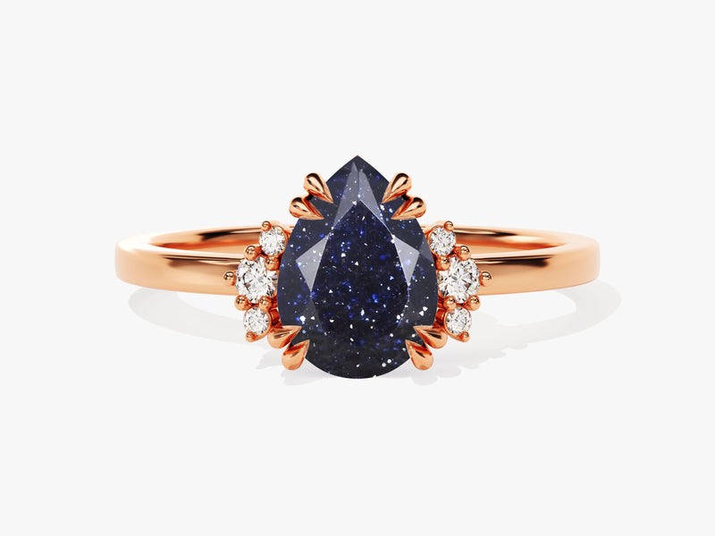 Pear Blue Sandstone Engagement Ring with Round Moissanite Sidestones.