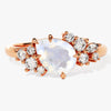 Pear Moonstone Engagement Ring with Round Moissanite Cluster