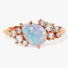 Pear Opal Engagement Ring with Round Moissanite Cluster