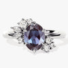 Oval Lab Alexandrite Engagement Ring with Round Moissanite Cluster