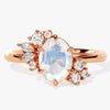 Oval Moonstone Engagement Ring with Round Moissanite Cluster