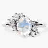 Oval Moonstone Engagement Ring with Round Moissanite Cluster