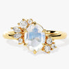 Oval Moonstone Engagement Ring with Round Moissanite Cluster