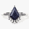 Kite Blue Sandstone Engagement Ring with Baguette Moissanite Sidestones.