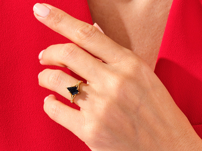 Kite Blue Sandstone Split Shank Engagement Ring with Moissanite Accents.