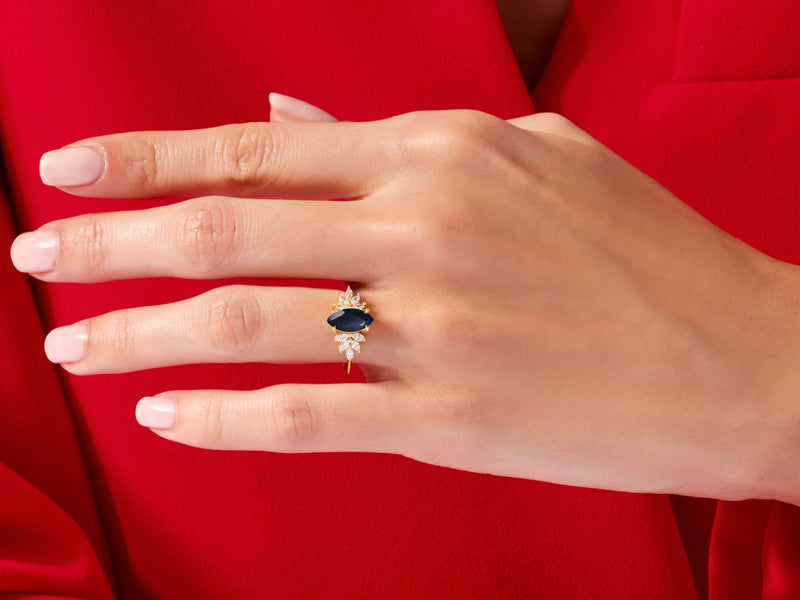 Marquise Blue Sandstone Vintage Engagement Ring with Moissanite Sidestones.