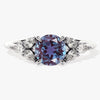 Round Lab Alexandrite Engagement Ring with Pear Moissanite Sidestones