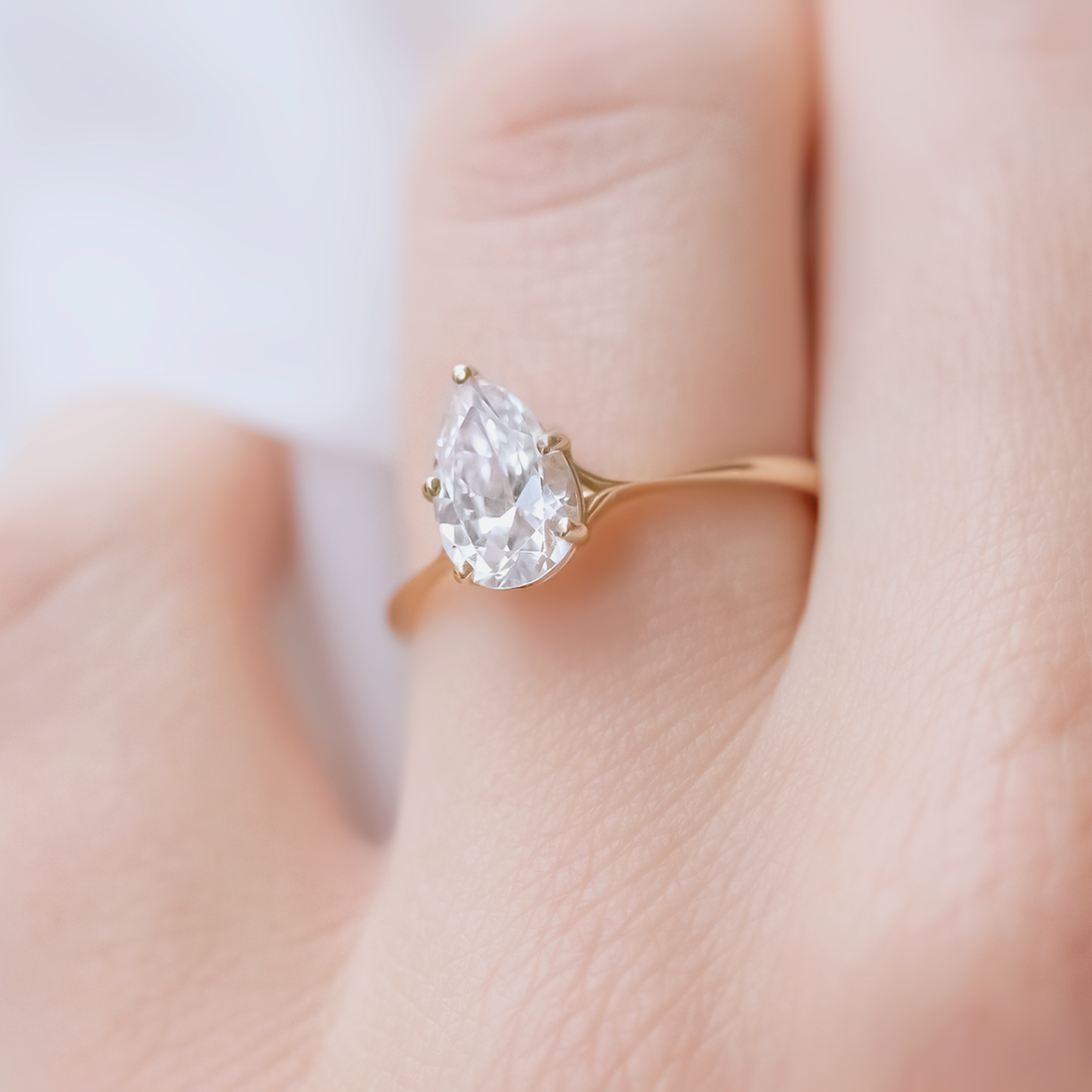 1.33CT Pear Cut Moissanite Engagement Ring in 18K Yellow Gold