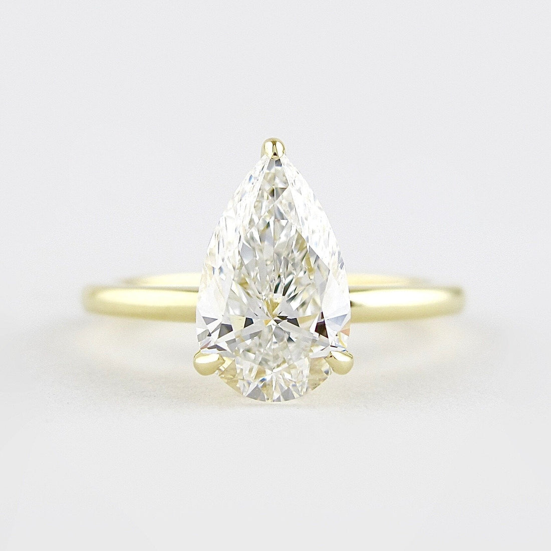 1.50CT Pear Moissanite Solitaire Engagement Ring With Hidden Halo Setting