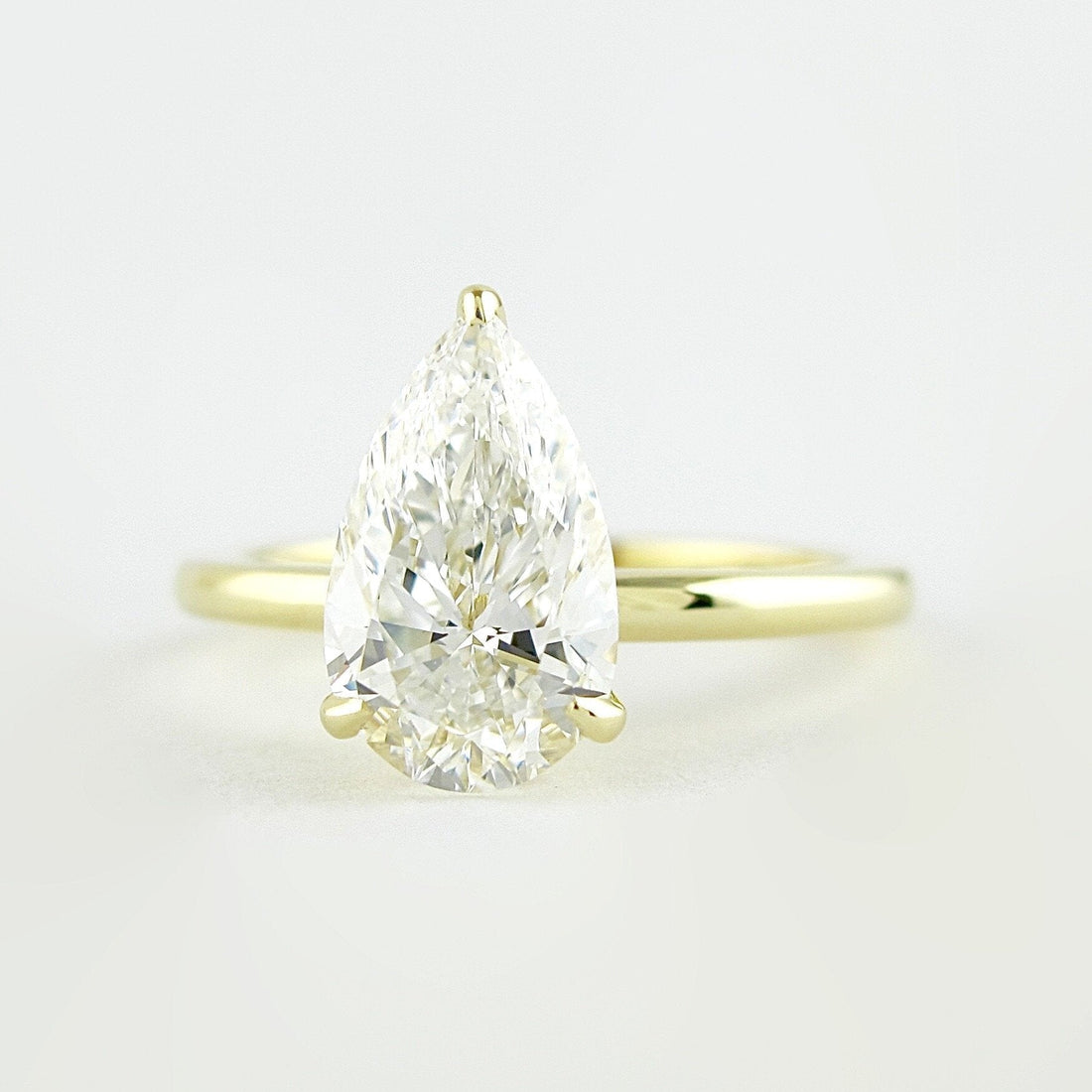 1.50CT Pear Moissanite Solitaire Engagement Ring With Hidden Halo Setting