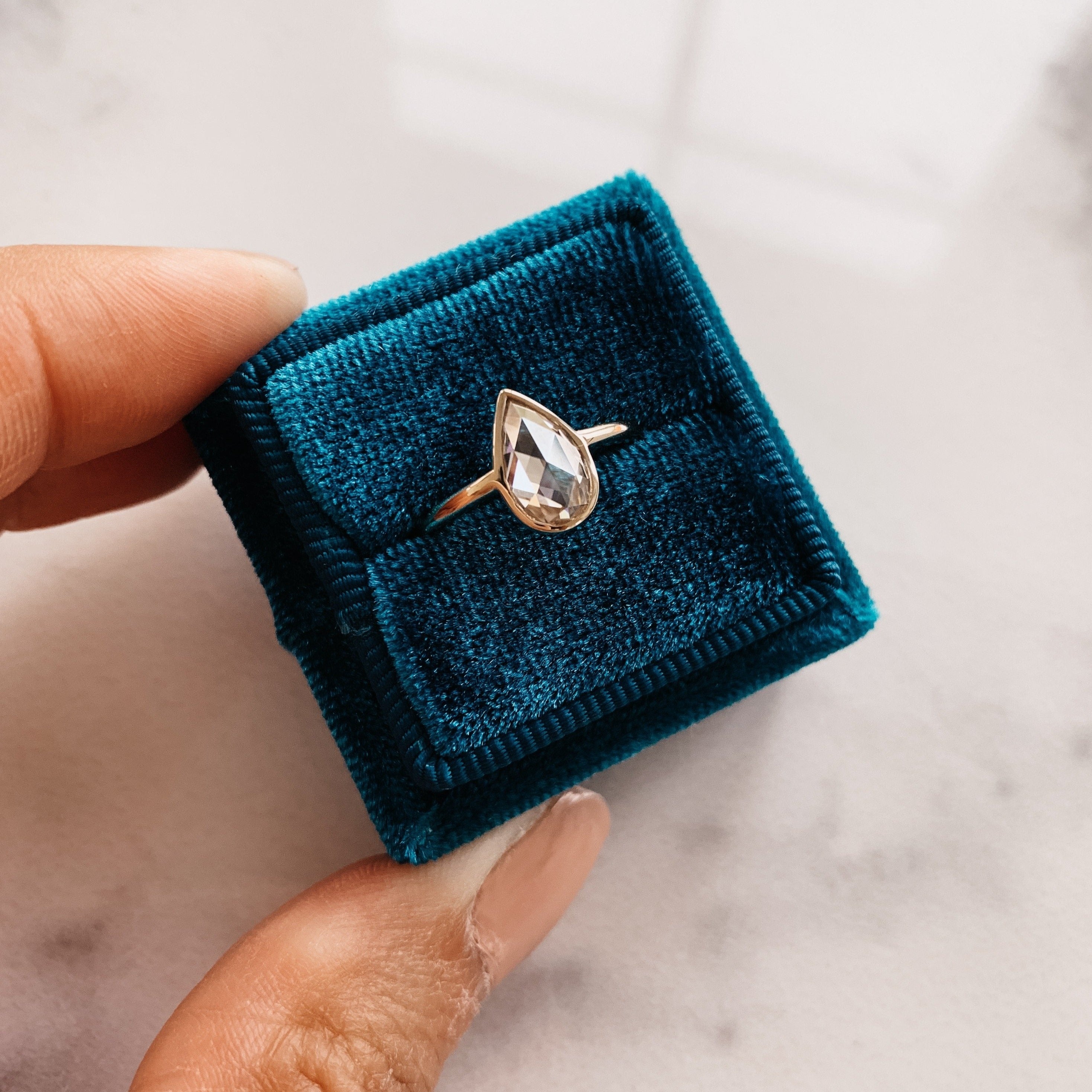 0.80CT Pear Cut Moissanite Bezel Style Engagement Ring