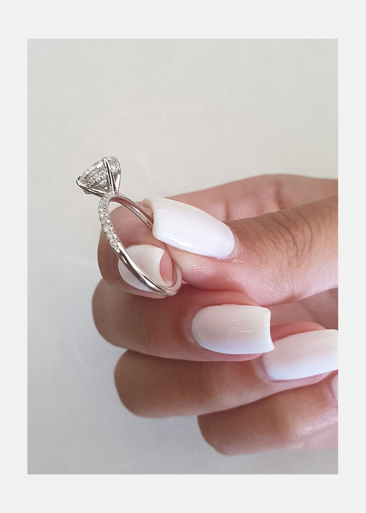 1.0ct Oval Cut Solitaire Hidden Halo Style Moissanite Engagement Ring